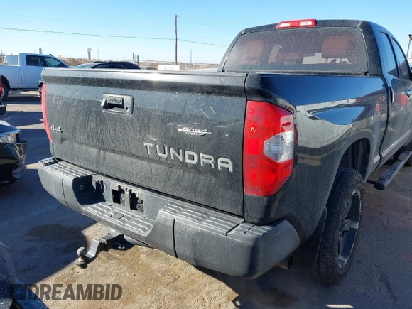 2014 Toyota Tundra 4WD Truck SR with VIN 5TFUM5F17EX051674, listed as a IAAI auction lot 41296906 with 140,782 mi miles. Bid and sale history available at carsss.com. Image 16.