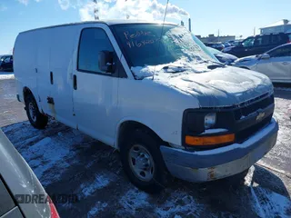 2007 Chevrolet Express Cargo Van with VIN 1GCGG25VX71126543, listed as a IAAI auction lot 41642079 with 97,859 mi miles. Bid and sale history available at carsss.com. Image 1.