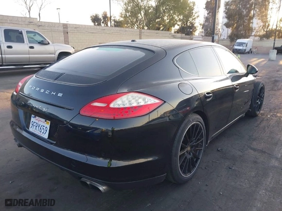 2012 Porsche Panamera Turbo with VIN WP0AC2A79CL090481, listed as a IAAI auction lot 41954044 with 59,433 mi miles. Bid and sale history available at carsss.com. Image 4.