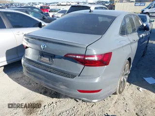 2021 Volkswagen Jetta GLI S with VIN 3VW6T7BUXMM019570, listed as a IAAI auction lot 41879222 with 42,948 mi miles and . Bid and sale history available at DreamBid. Image 4.