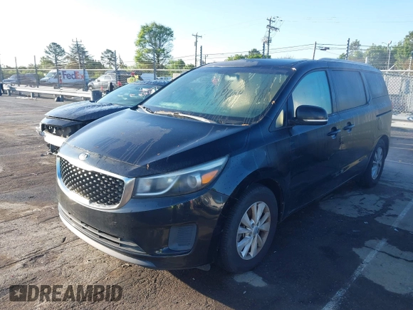 2016 Kia Sedona LX with VIN KNDMB5C15G6090413, listed as a IAAI auction lot 41991231 with 162,326 mi miles. Bid and sale history available at carsss.com. Image 2.
