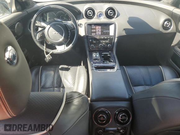2013 Jaguar XJ Portfolio with VIN SAJWJ2GDXD8V45921, listed as a Copart auction lot 49289825 with 115,152 mi miles and Salvage title. Bid and sale history available at DreamBid. Image 8.