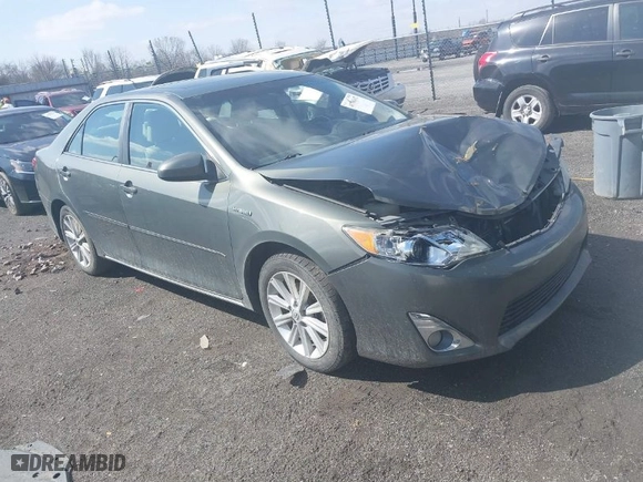 2014 Toyota Camry Hybrid LE with VIN 4T1BD1FK6EU129691, listed as a IAAI auction lot 41796112 with 264,392 mi miles. Bid and sale history available at carsss.com. Image 1.