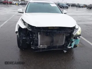 2015 Infiniti Q50 Premium with VIN JN1BV7AR1FM393866, listed as a IAAI auction lot 41807059 with 79,300 mi miles. Bid and sale history available at carsss.com. Image 6.