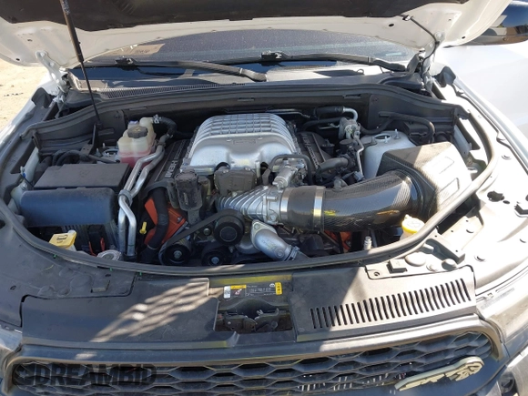 2021 Dodge Durango SRT Hellcat with VIN 1C4SDJH96MC692601, listed as a IAAI auction lot 41764490 with 27,434 mi miles and . Bid and sale history available at DreamBid. Image 10.