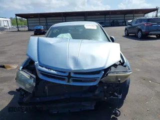 2013 Dodge Avenger SXT with VIN 1C3CDZCB0DN521591, listed as a IAAI auction lot 41891451 with 100,234 mi miles and . Bid and sale history available at carsss.com. Image 12.