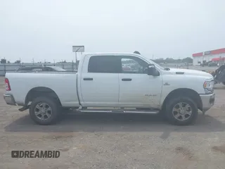 2023 Ram 2500 Big Horn with VIN 3C6UR5DL4PG651105, listed as a IAAI auction lot 42397597 with 53,829 mi miles and . Bid and sale history available at DreamBid. Image 13.