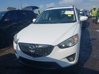2014 Mazda CX-5 Grand Touring with VIN JM3KE2DY1E0424890, listed as a IAAI auction lot 42052437 with 107,793 mi miles. Bid and sale history available at carsss.com. Image 12.