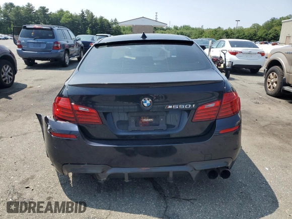 2016 BMW 5 Series 550i xDrive with VIN WBAKP9C52GG587591, listed as a Copart auction lot 58402505 with 94,384 mi miles and Salvage title. Bid and sale history available at DreamBid. Image 6.