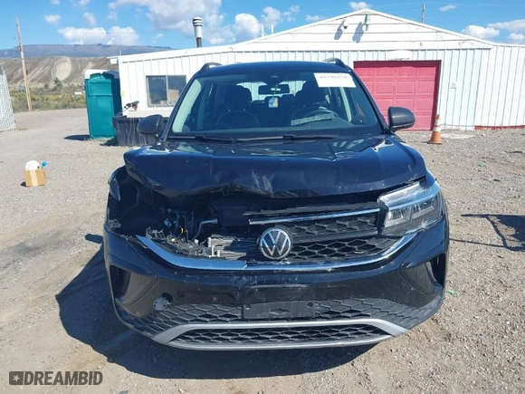 2022 Volkswagen Taos S with VIN 3VVMX7B28NM032236, listed as a IAAI auction lot 40396478 with 28,467 mi miles. Bid and sale history available at carsss.com. Image 12.