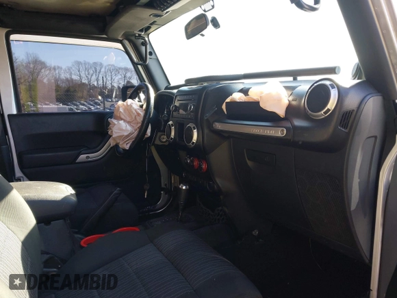 2011 Jeep Wrangler Rubicon with VIN 1J4BA6D10BL514776, listed as a IAAI auction lot 41487396 with 172,208 mi miles. Bid and sale history available at carsss.com. Image 5.