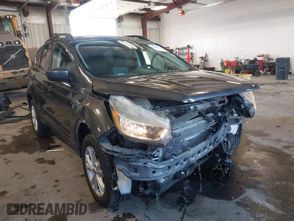 2018 Ford Escape SE with VIN 1FMCU9GD1JUC36452, listed as a IAAI auction lot 41964531 with 89,457 mi miles. Bid and sale history available at carsss.com. Image 1.