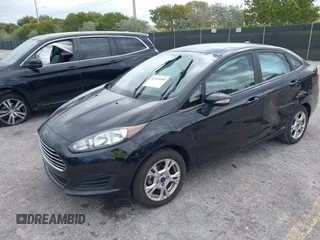 2015 Ford Fiesta SE with VIN 3FADP4BJ5FM130099, listed as a IAAI auction lot 42126960 with 82,299 mi miles and . Bid and sale history available at DreamBid. Image 2.