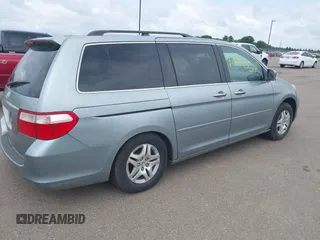 2007 Honda Odyssey EX-L z VIN 5FNRL38717B124209, wystawiony jako IAAI lot #42444334 z przebiegiem 230 123 mil mil oraz . Historia ofert i sprzedaży dostępna na DreamBid. Obrazek 4.