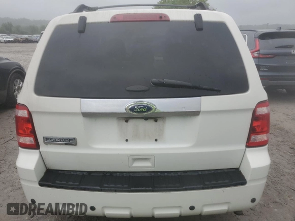 2012 Ford Escape Limited z VIN 1FMCU0E79CKA07119, wystawiony jako Copart lot #61087365 z przebiegiem 159 031 mil mil oraz Czysty tytuł • Clean title. Historia ofert i sprzedaży dostępna na DreamBid. Obrazek 6.