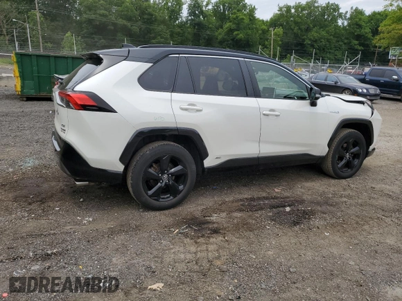 2019 Toyota RAV4 Hybrid XSE with VIN JTMEWRFV4KJ004433, listed as a Copart auction lot 58400445 with 101,108 mi miles and Salvage title. Bid and sale history available at DreamBid. Image 3.