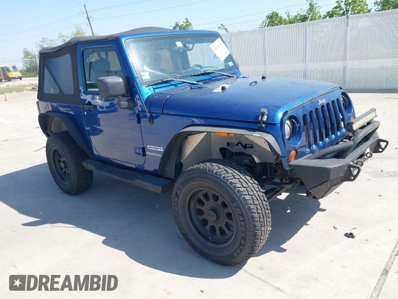 2010 Jeep Wrangler Sport with VIN 1J4AA2D11AL117404, listed as a IAAI auction lot 42012340 with 266,310 mi miles and . Bid and sale history available at carsss.com. Image 1.
