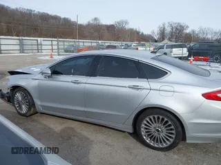 2015 Ford Fusion Titanium with VIN 3FA6P0D95FR103444, listed as a IAAI auction lot 41411473 with 213,729 mi miles. Bid and sale history available at carsss.com. Image 15.