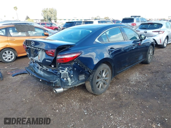 2020 Mazda 6 Sport with VIN JM1GL1UM5L1519519, listed as a IAAI auction lot 41920571 with 59,378 mi miles and . Bid and sale history available at DreamBid. Image 4.