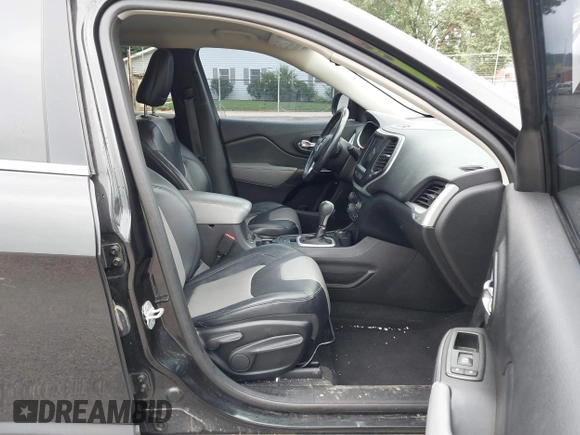 2014 Jeep Cherokee Limited with VIN 1C4PJMDS2EW120384, listed as a IAAI auction lot 42667778 with 121,206 mi miles and . Bid and sale history available at DreamBid. Image 5.