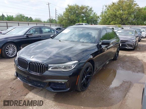 2017 BMW 7 Series 750i with VIN WBA7F0C55HGM21460, listed as a IAAI auction lot 41934198 with 58,206 mi miles and . Bid and sale history available at DreamBid. Image 2.