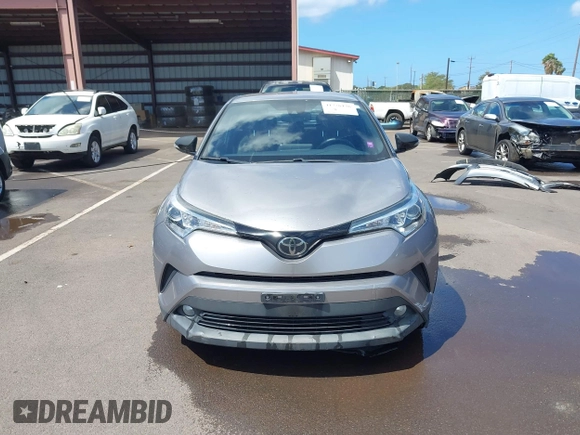 2018 Toyota C-HR XLE z VIN NMTKHMBX5JR009504, wystawiony jako IAAI lot #41776136 z przebiegiem 63 795 mil mil oraz . Historia ofert i sprzedaży dostępna na DreamBid. Obrazek 12.