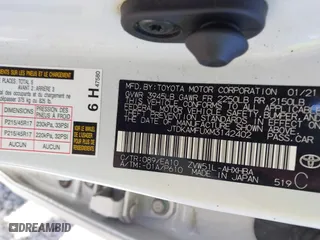 2021 Toyota Prius L Eco with VIN JTDKAMFUXM3142402, listed as a IAAI auction lot 41665484 with 67,416 mi miles. Bid and sale history available at carsss.com. Image 9.