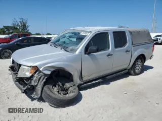 2014 Nissan Frontier S with VIN 1N6AD0EVXEN717297, listed as a Copart auction lot 53558875 with 173,004 mi miles and Salvage title. Bid and sale history available at DreamBid. Image 1.