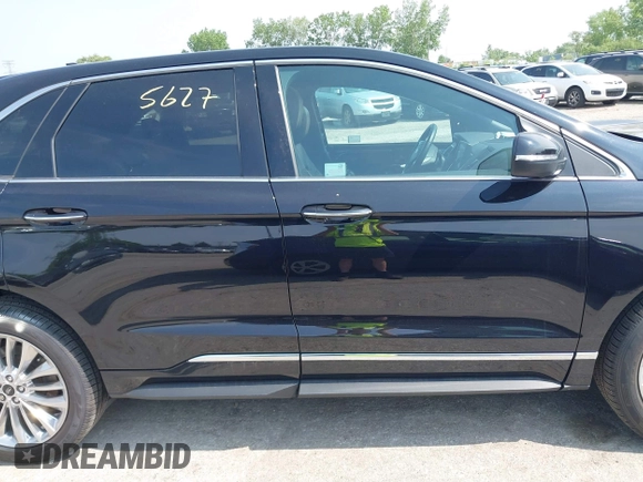 2022 Ford Edge Titanium with VIN 2FMPK4K99NBA12452, listed as a IAAI auction lot 42405627 with 53,015 mi miles and . Bid and sale history available at DreamBid. Image 13.