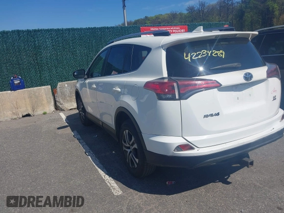 2017 Toyota RAV4 LE with VIN JTMBFREV4HJ112595, listed as a IAAI auction lot 42234289 with 207,379 mi miles and . Bid and sale history available at carsss.com. Image 3.