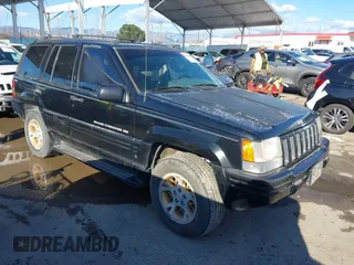 1998 Jeep Grand Cherokee Limited with VIN 1J4GZ78Y3WC105625, listed as a IAAI auction lot 41742805 with 222,045 mi miles. Bid and sale history available at carsss.com. Image 1.