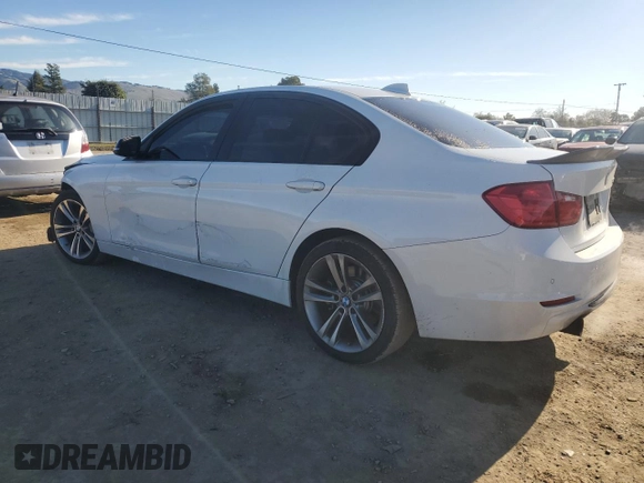 2012 BMW 3 Series 335i with VIN WBA3A9C59CF270736, listed as a Copart auction lot 87223824 with 124,700 mi miles and Salvage title. Bid and sale history available at DreamBid. Image 2.