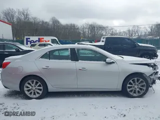 2013 Chevrolet Malibu LTZ with VIN 1G11H5SA1DF156012, listed as a IAAI auction lot 41231845 with 88,226 mi miles. Bid and sale history available at carsss.com. Image 13.