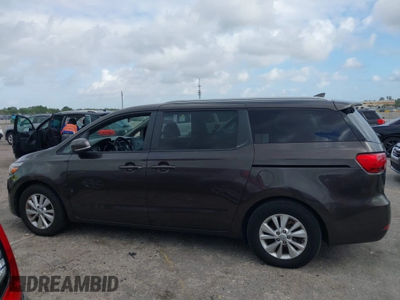 2018 Kia Sedona LX with VIN KNDMB5C15J6382599, listed as a IAAI auction lot 41964769 with 82,494 mi miles. Bid and sale history available at carsss.com. Image 14.