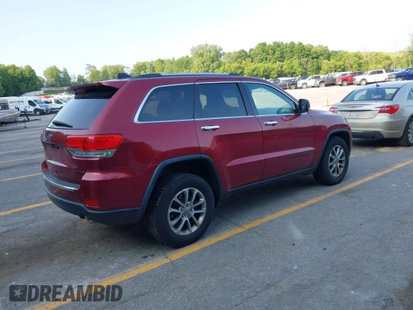 2014 Jeep Grand Cherokee Limited with VIN 1C4RJFBG8EC553860, listed as a IAAI auction lot 42452419 with 174,274 mi miles and . Bid and sale history available at DreamBid. Image 4.