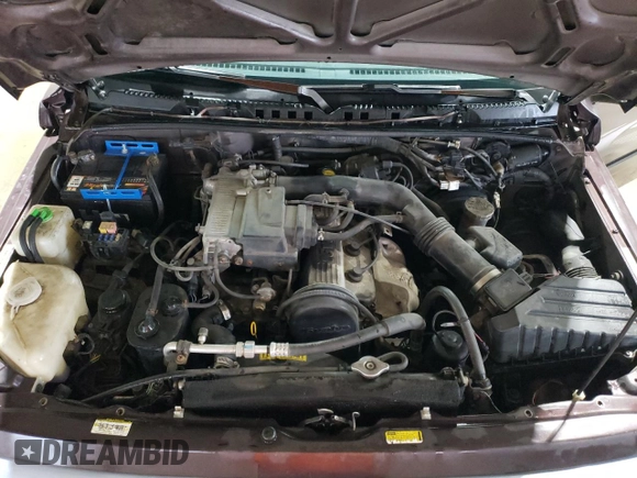 1998 Chevrolet Tracker z VIN 2CNBJ1362W6919635, wystawiony jako Copart lot #56894355 z przebiegiem 140 298 mil mil oraz Szkoda całkowita • Salvage title. Historia ofert i sprzedaży dostępna na DreamBid. Obrazek 12.