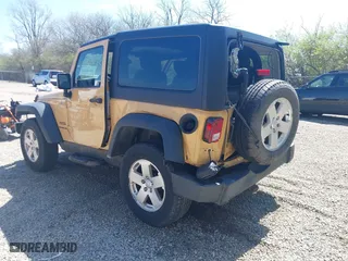 2013 Jeep Wrangler Sport with VIN 1C4AJWAG8DL676619, listed as a IAAI auction lot 41942627 with 130,306 mi miles. Bid and sale history available at carsss.com. Image 3.