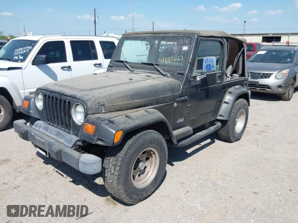 1998 Jeep Wrangler SE with VIN 1J4FY29P1WP806244, listed as a IAAI auction lot 41885627 with 131,486 mi miles. Bid and sale history available at carsss.com. Image 2.