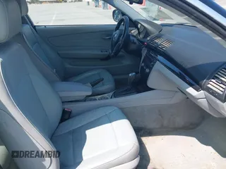 2011 BMW 1 Series 128i with VIN WBAUP9C51BVL90277, listed as a IAAI auction lot 42572690 with 153,427 mi miles and . Bid and sale history available at DreamBid. Image 5.