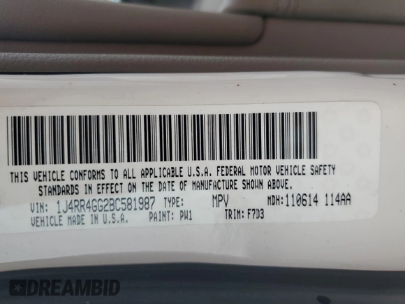 2011 Jeep Grand Cherokee Laredo with VIN 1J4RR4GG2BC581987, listed as a Copart auction lot 64072515 with 213,607 mi miles and Clean title. Bid and sale history available at DreamBid. Image 13.