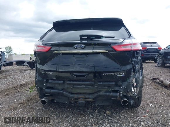 2020 Ford Edge Titanium with VIN 2FMPK4K94LBA22657, listed as a IAAI auction lot 42340706 with 62,857 mi miles and . Bid and sale history available at DreamBid. Image 17.