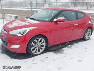 2014 Hyundai Veloster with VIN KMHTC6AD8EU214612, listed as a IAAI auction lot 41258820 with 61,984 mi miles. Bid and sale history available at carsss.com. Image 2.