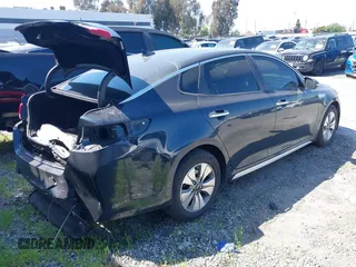 2018 Kia Optima Hybrid Premium with VIN KNAGT4LE9J5023217, listed as a IAAI auction lot 41901781 with 113,196 mi miles. Bid and sale history available at carsss.com. Image 4.