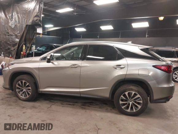 2021 Lexus RX with VIN 2T2HZMDA7MC292353, listed as a IAAI auction lot 41320034 with 29,571 mi miles. Bid and sale history available at carsss.com. Image 14.