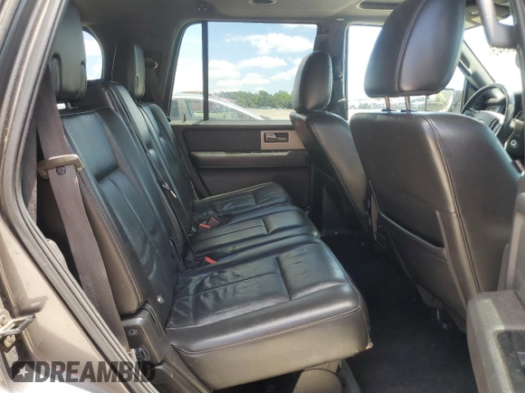 2013 Ford Expedition Limited z VIN 1FMJU2A50DEF11632, wystawiony jako Copart lot #55976345 z przebiegiem 176 168 mil mil oraz Szkoda całkowita • Salvage title. Historia ofert i sprzedaży dostępna na DreamBid. Obrazek 11.