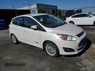 2015 Ford C-Max Energi SEL with VIN 1FADP5CU7FL124420, listed as a Copart auction lot 61145393 with 110,319 mi miles. Bid and sale history available at carsss.com. Image 4.