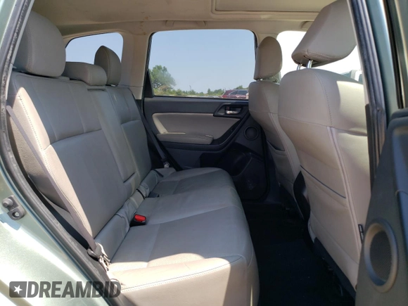 2014 Subaru Forester Touring with VIN JF2SJAMC4EH404204, listed as a Copart auction lot 60196965 with 200,292 mi miles and Salvage title. Bid and sale history available at DreamBid. Image 11.