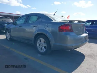 2013 Dodge Avenger SXT with VIN 1C3CDZCG5DN544909, listed as a IAAI auction lot 42274681 with 136,781 mi miles and . Bid and sale history available at DreamBid. Image 3.
