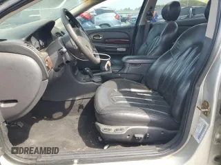 2000 Chrysler 300M M with VIN 2C3HE66G9YH383296, listed as a Copart auction lot 52339395 with 128,842 mi miles and Salvage Title. Bid and sale history available at DreamBid. Image 7.