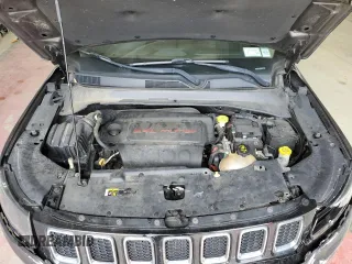 2018 Jeep Compass Altitude with VIN 3C4NJDBB9JT457242, listed as a Copart auction lot 60886385 with 143,467 mi miles and Salvage title. Bid and sale history available at DreamBid. Image 12.